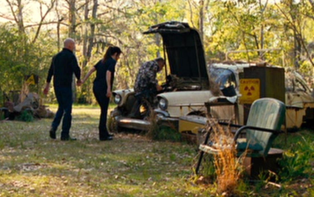 Movie still from RED showing a secret underground lair; inspiration for Stephany Simmons' Team Quirky & Unhinged blog post.